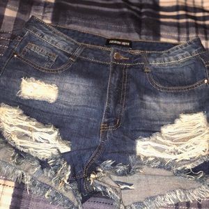 Fashion Nova Size L “11” high waste rip shorts